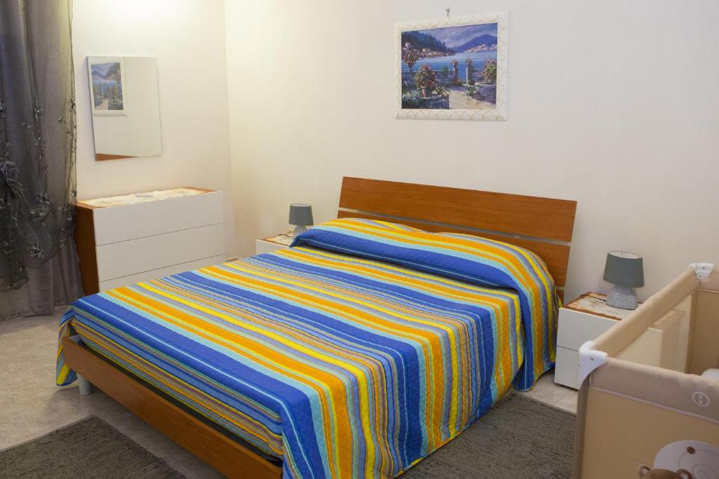 Posteľ alebo postele v izbe v ubytovaní Casa Vacanze Calafarina