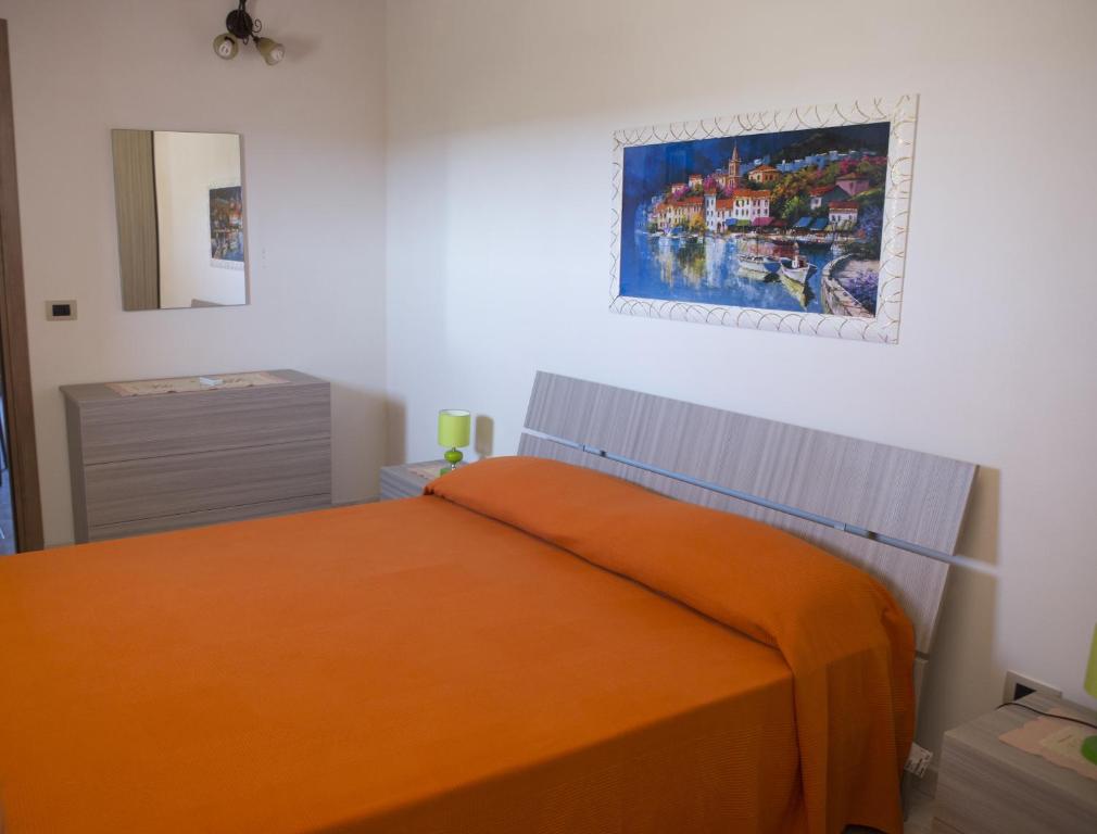 Posteľ alebo postele v izbe v ubytovaní Casa Vacanze Calafarina