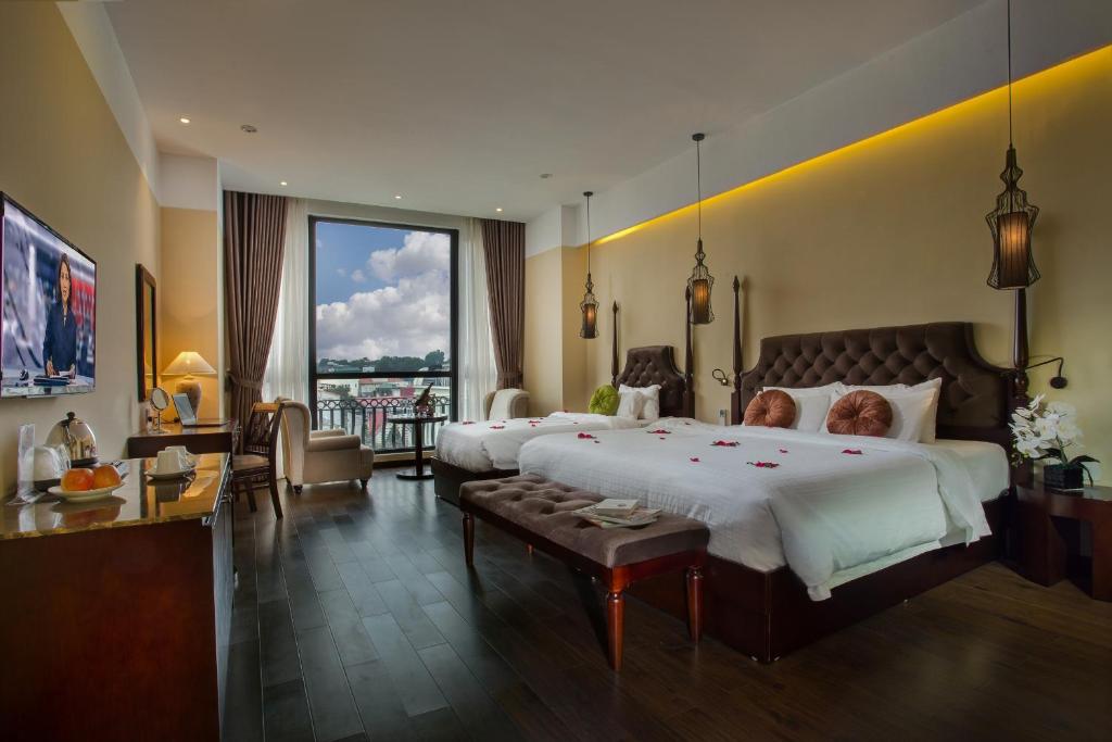 Postel nebo postele na pokoji v ubytování Hanoi Marvellous Hotel & Spa