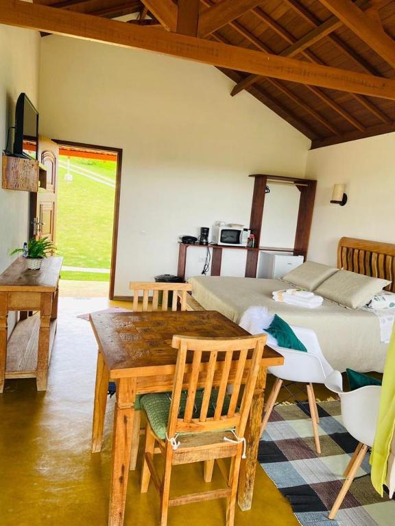 Postel nebo postele na pokoji v ubytování Chalés Terras Altas