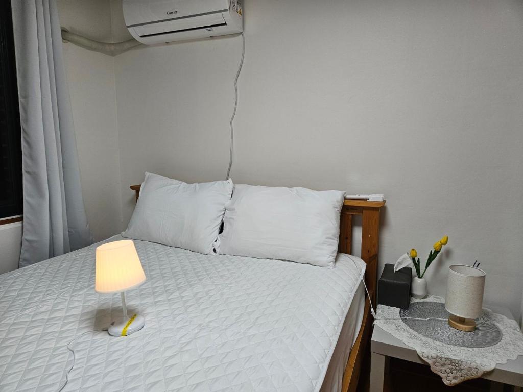 Postel nebo postele na pokoji v ubytování Stay SPC
