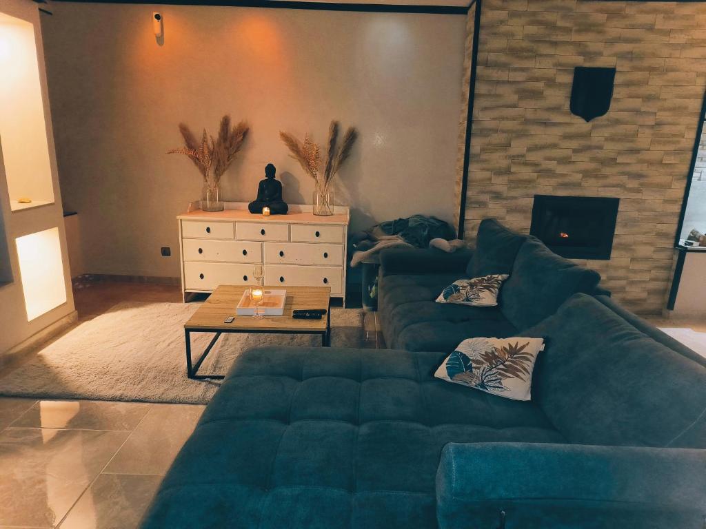 Khu vực ghế ngồi tại Maison cosy 2 chambres proche Troyes