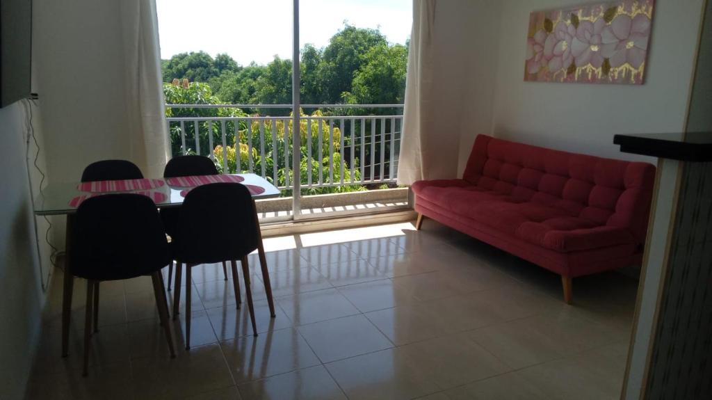 Posezení v ubytování Casa Río Apartamento con Aire Acondicionado y piscina