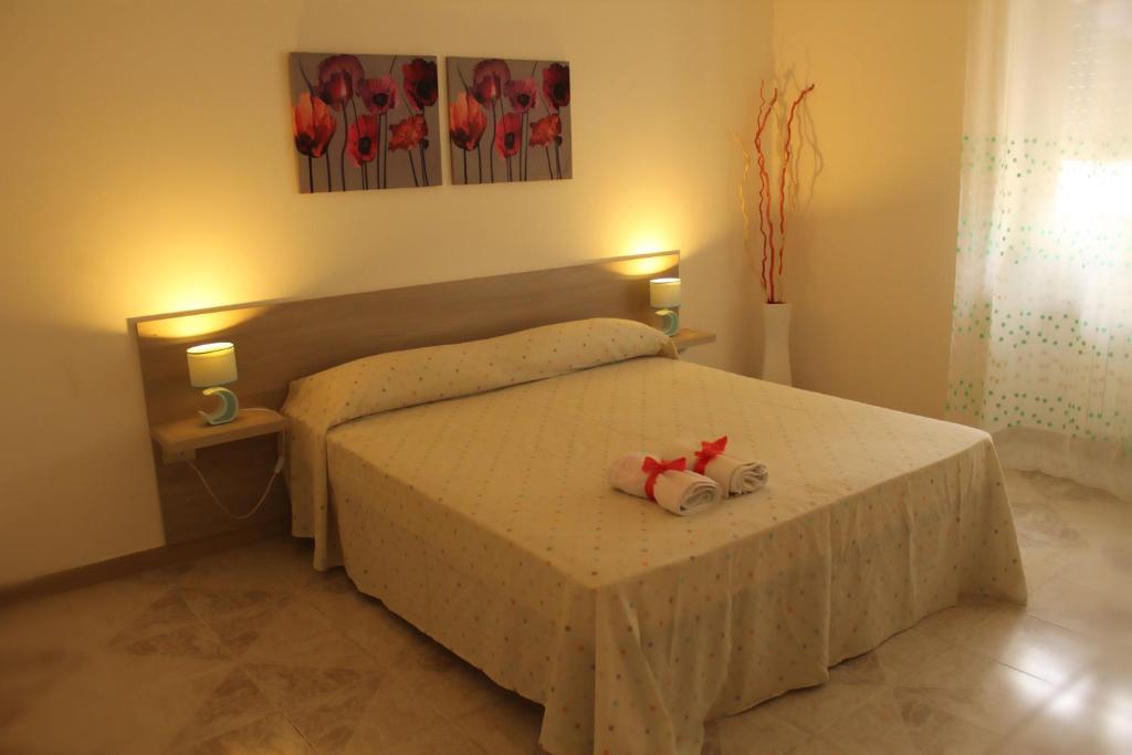 Postel nebo postele na pokoji v ubytování Stelle Sul Salento Holiday Home