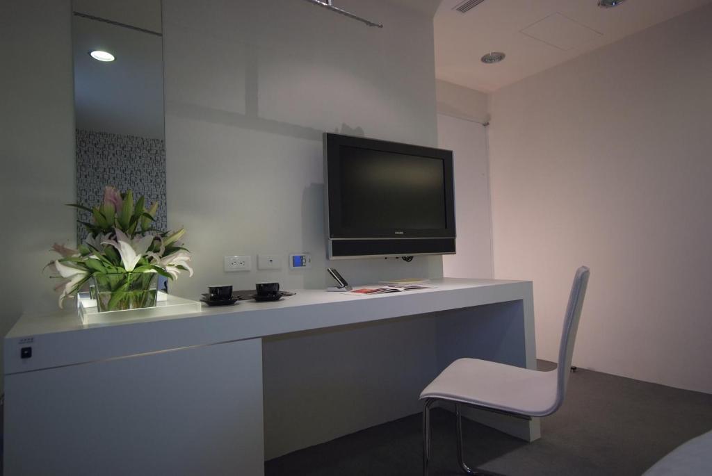 TV a/nebo společenská místnost v ubytování Hotel Purity