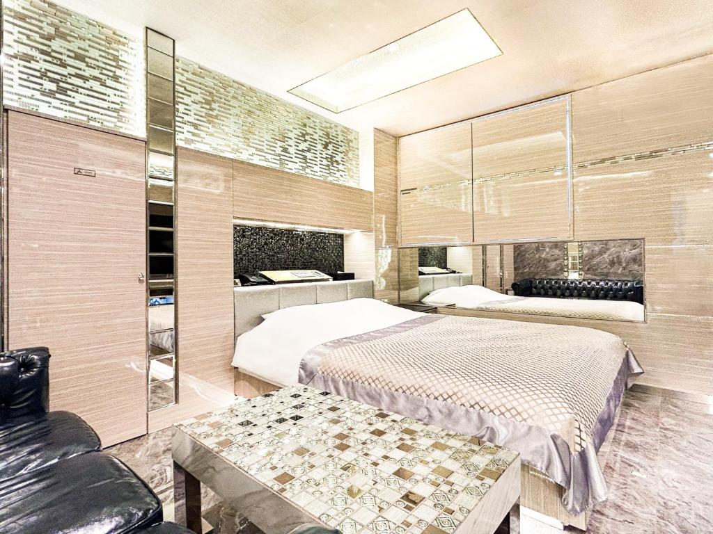 Postel nebo postele na pokoji v ubytování Hotel Century