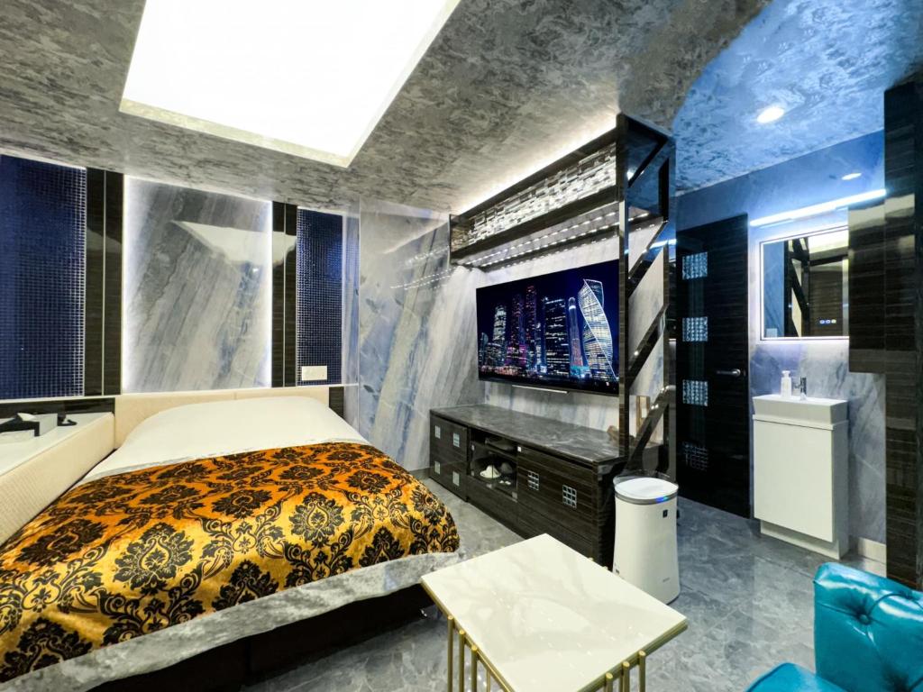 Postel nebo postele na pokoji v ubytování Hotel Century