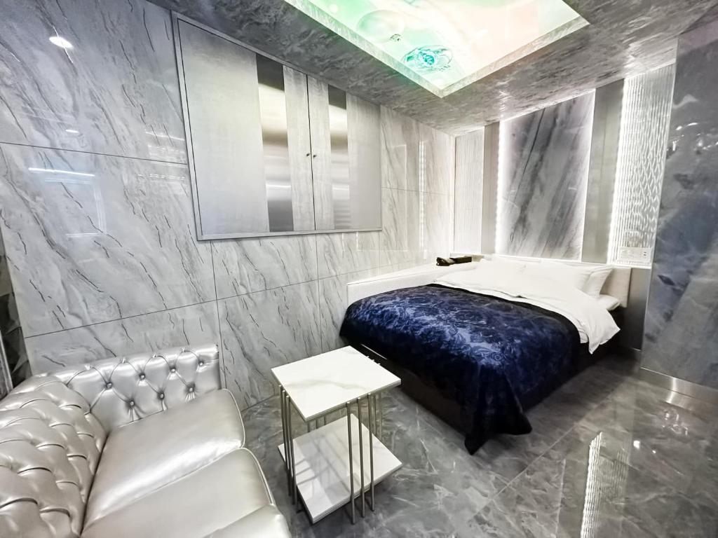 Postel nebo postele na pokoji v ubytování Hotel Century