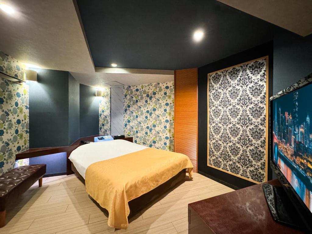 Postel nebo postele na pokoji v ubytování Hotel Century