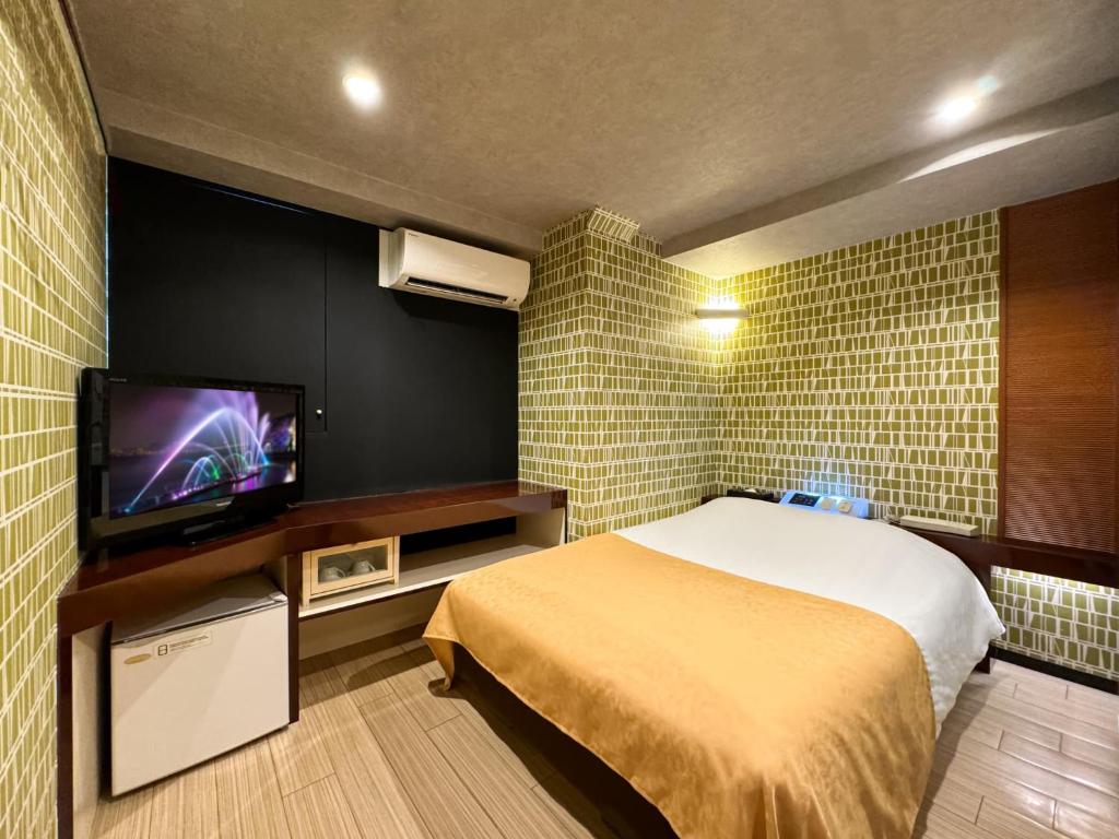 TV a/nebo společenská místnost v ubytování Hotel Century