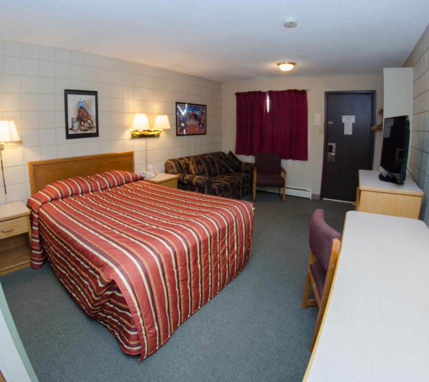 Postel nebo postele na pokoji v ubytování Plains Motel