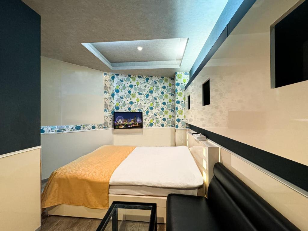 Postel nebo postele na pokoji v ubytování Hotel Century