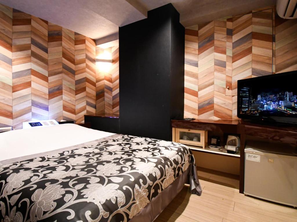 Postel nebo postele na pokoji v ubytování Hotel Century