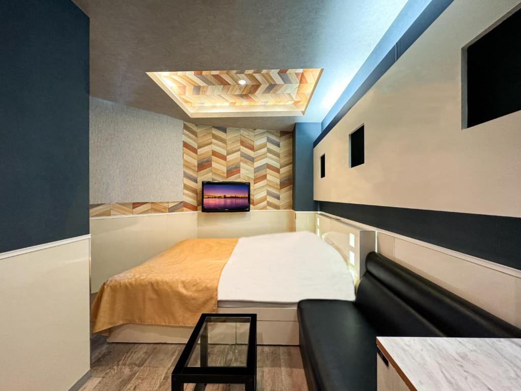 Postel nebo postele na pokoji v ubytování Hotel Century