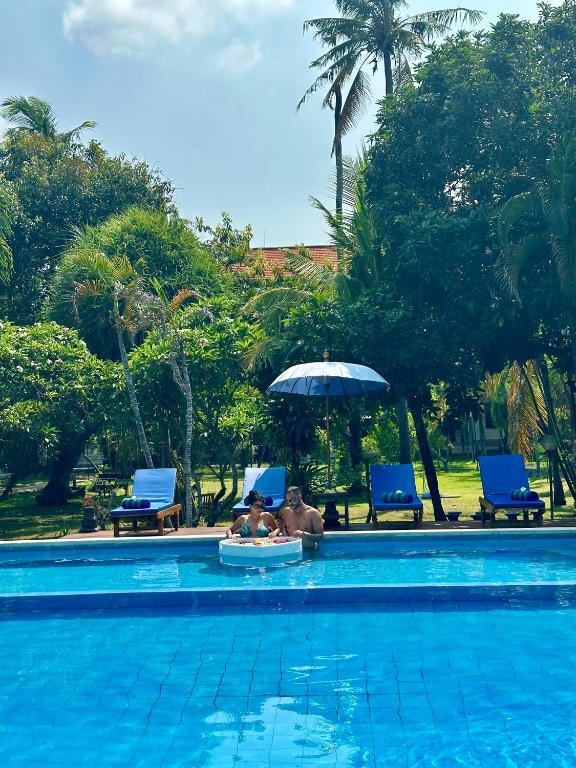 Bazén v ubytování New Mekar Jaya Hotel nebo v jeho okolí