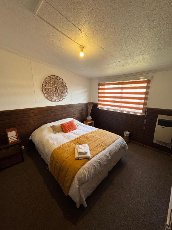 Postel nebo postele na pokoji v ubytování Hostal Amerindia