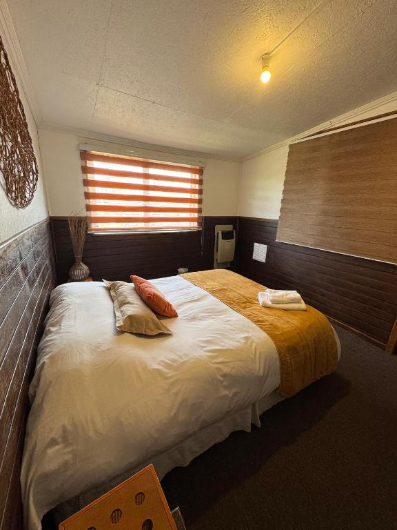 Postel nebo postele na pokoji v ubytování Hostal Amerindia