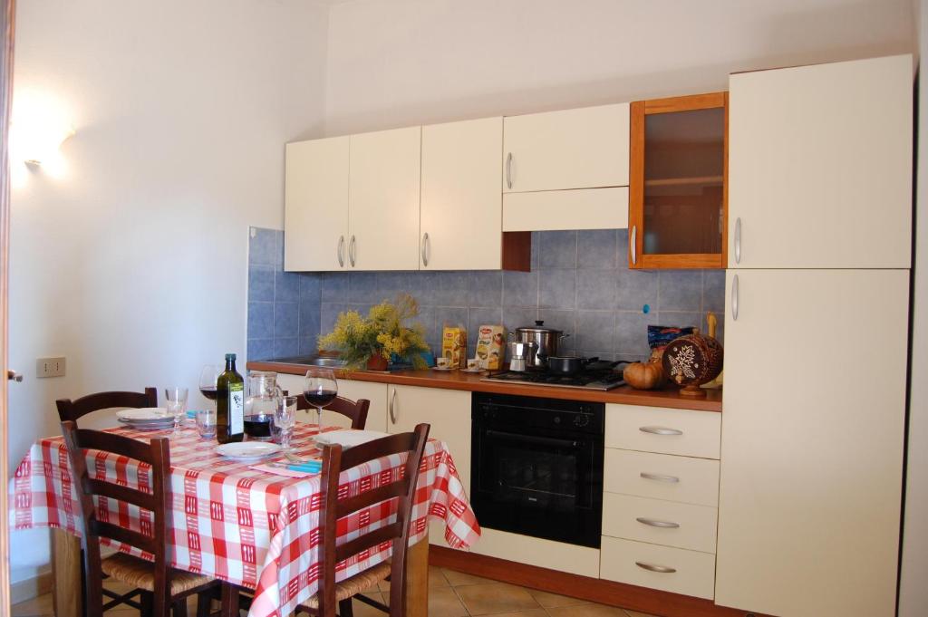 Кухня или мини-кухня в Agriturismo Il Cipresso
