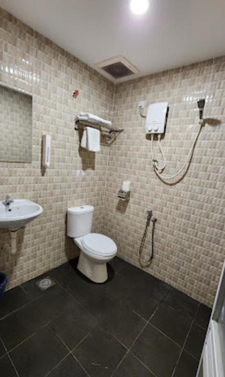 Koupelna v ubytování Sam Hotel