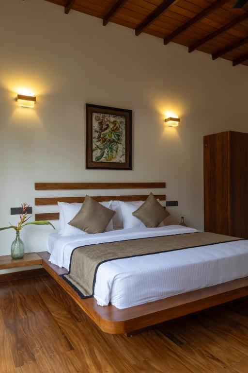 Letto o letti in una camera di Mudliyar House