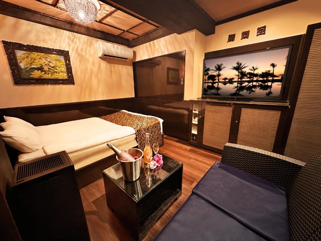 Postel nebo postele na pokoji v ubytování Hotel Gran Bali Resort
