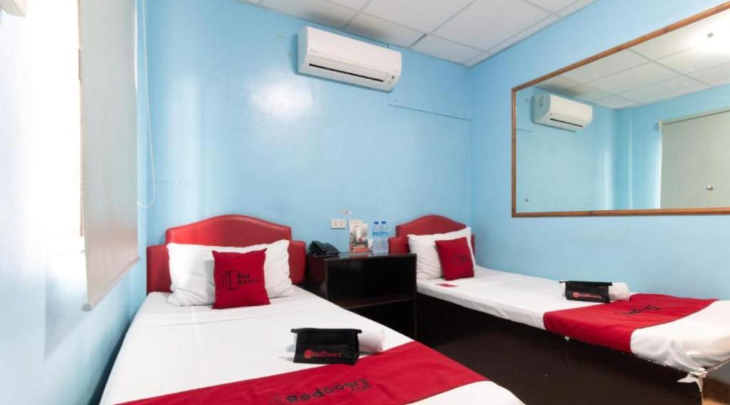 Voodi või voodid majutusasutuse RedDoorz @ Picas Sagkahan Tacloban toas