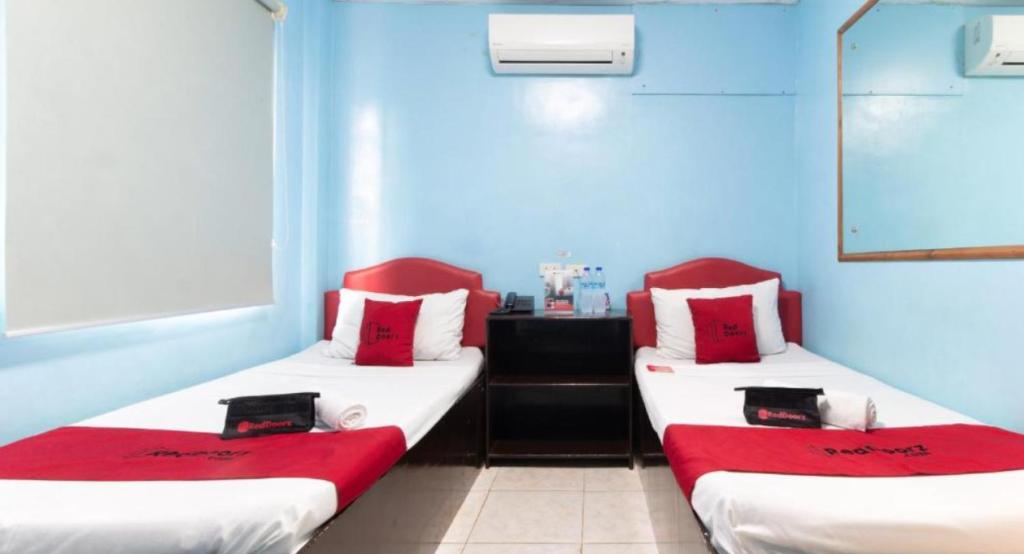 Voodi või voodid majutusasutuse RedDoorz @ Picas Sagkahan Tacloban toas