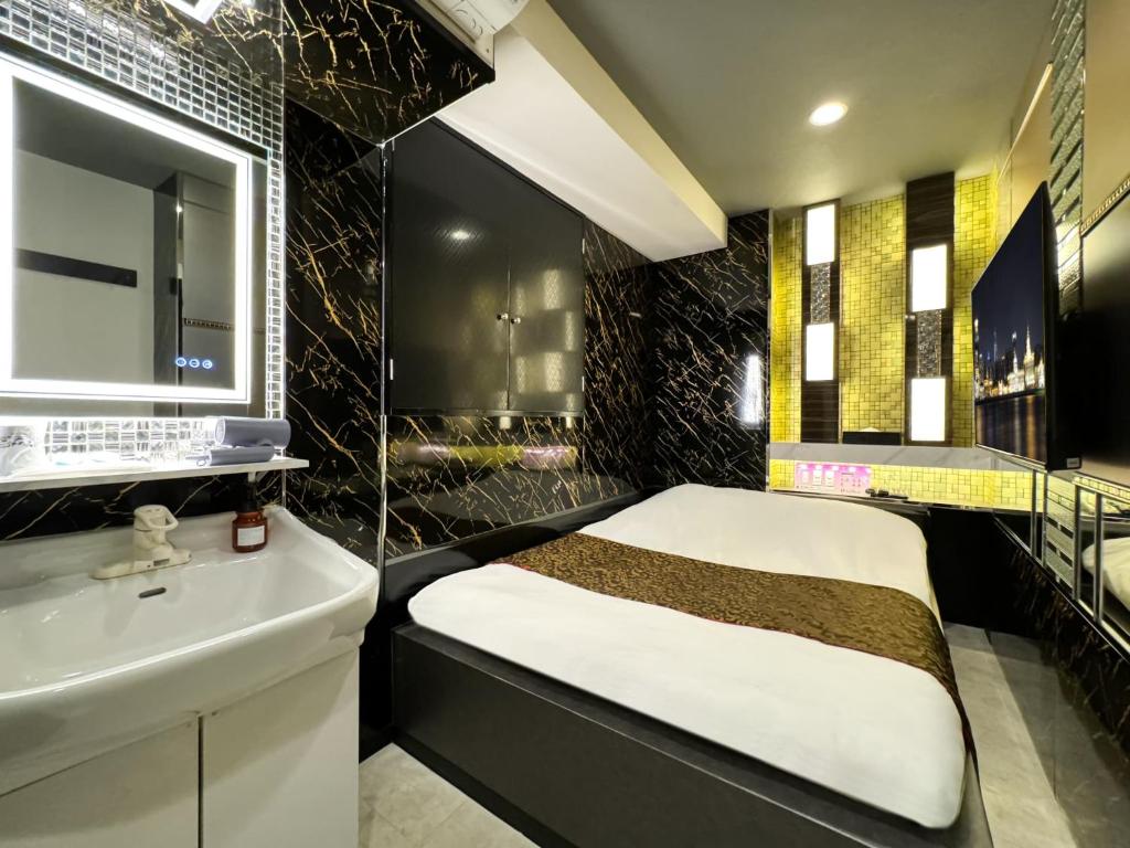 Postel nebo postele na pokoji v ubytování Hotel Amethyst