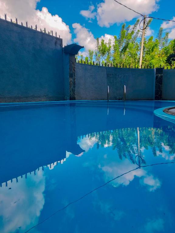 Bazén v ubytování Aura Residence nebo v jeho okolí