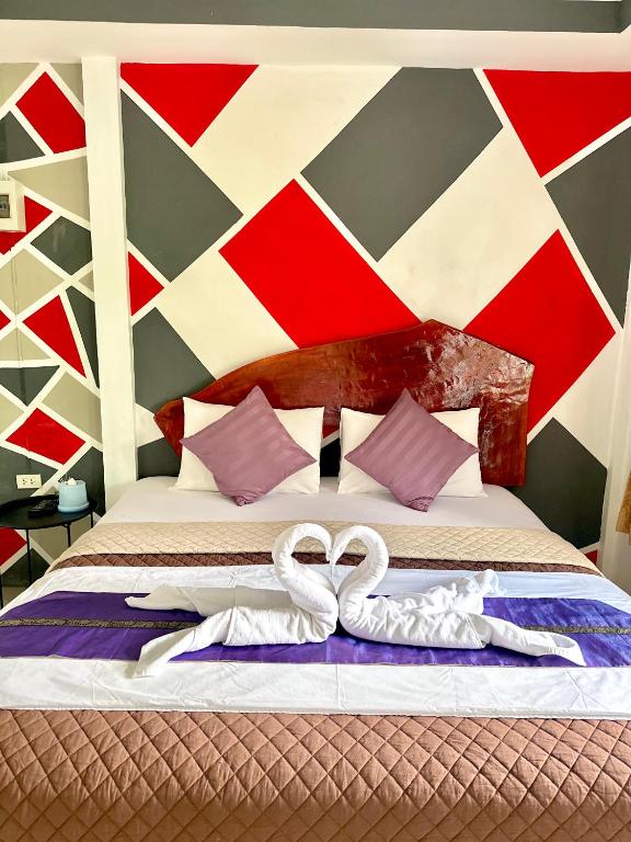 Postel nebo postele na pokoji v ubytování Suntalee House