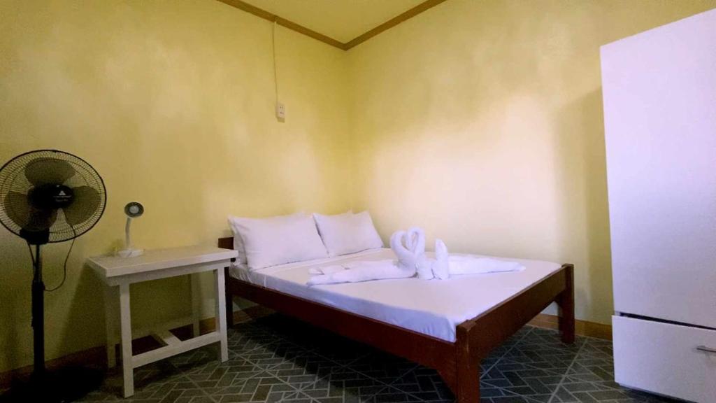 Postel nebo postele na pokoji v ubytování L&L Beach Resort
