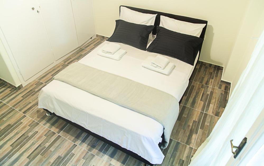 Posteľ alebo postele v izbe v ubytovaní Fiλoξεnia in Gazi- Athens center Apartment