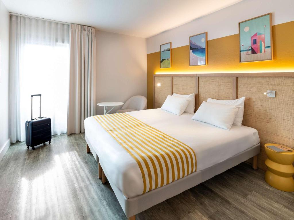 Postel nebo postele na pokoji v ubytování ibis Styles Biarritz Plage