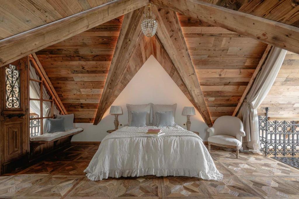 a bedroom with a bed in a attic at Villa Vena in Zakopane