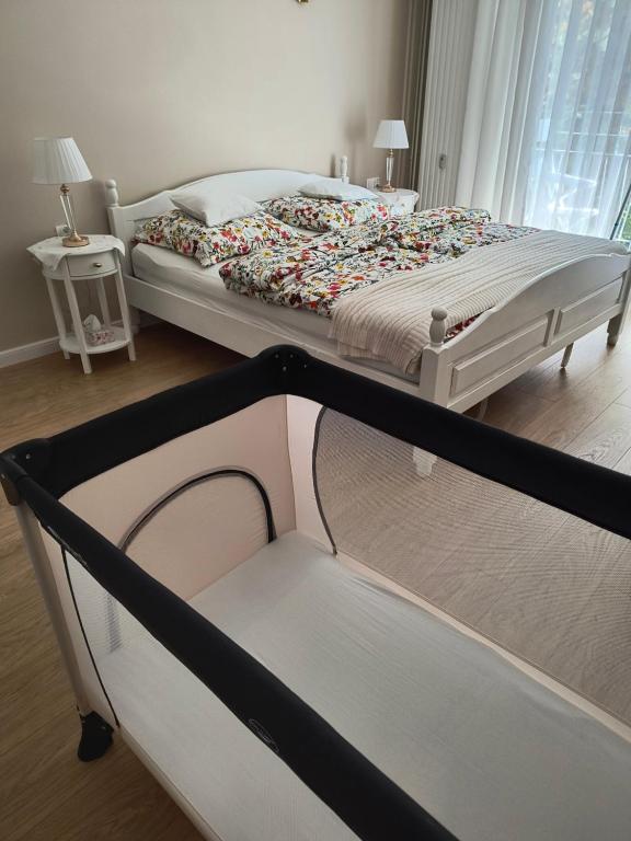Postel nebo postele na pokoji v ubytování Apartament MAX