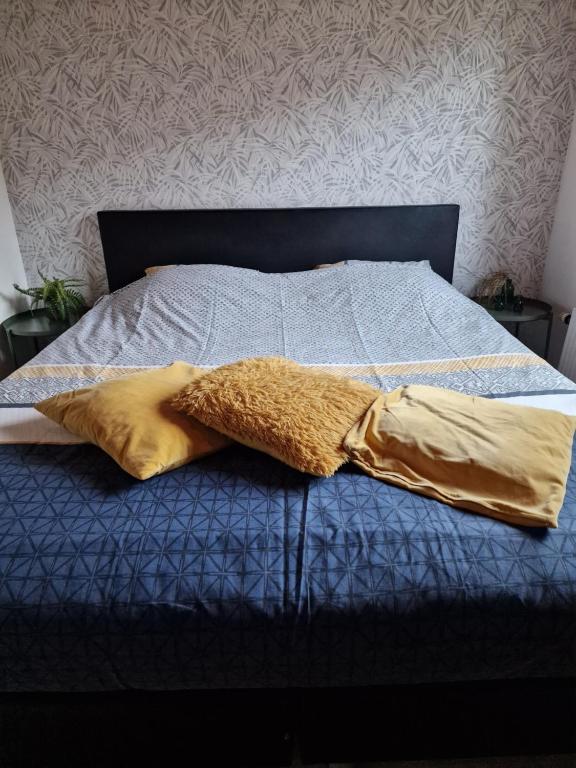 Postel nebo postele na pokoji v ubytování Bungalow Belle Vue - Camping International - Bomal - Durbuy