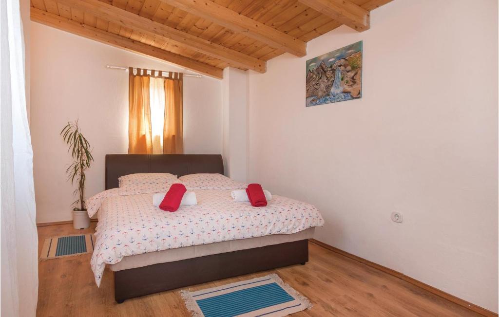 Postel nebo postele na pokoji v ubytování Two-Bedroom Holiday Home In Valtura