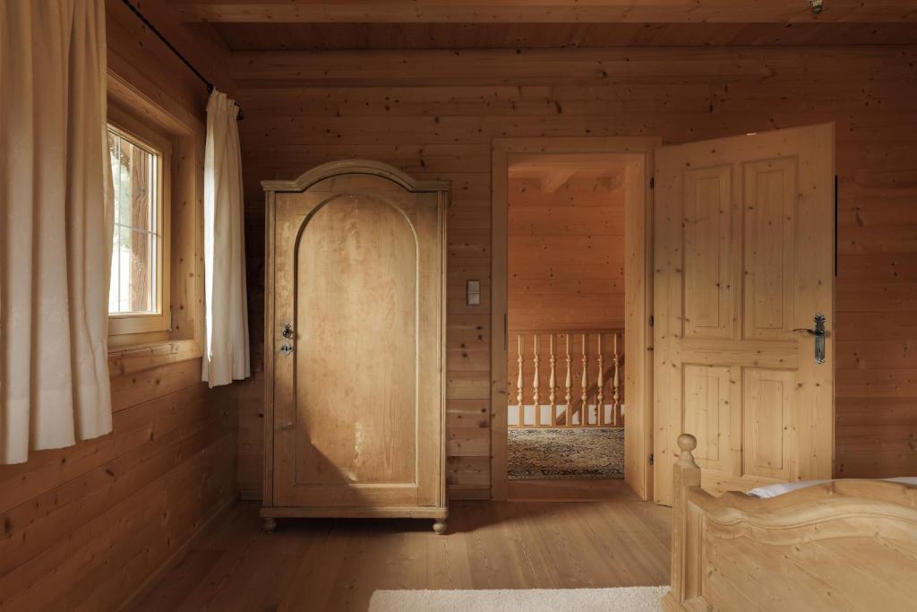 Postel nebo postele na pokoji v ubytování Alpen-Chalet-Pankraz