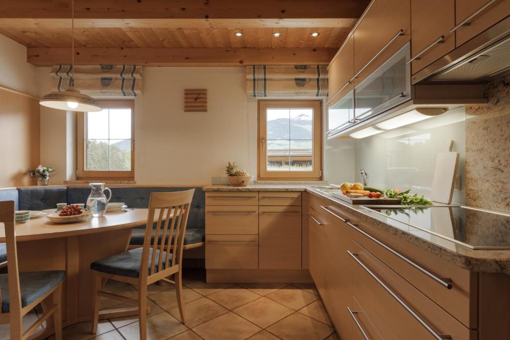 Kuchyň nebo kuchyňský kout v ubytování Alpen-Chalet-Pankraz