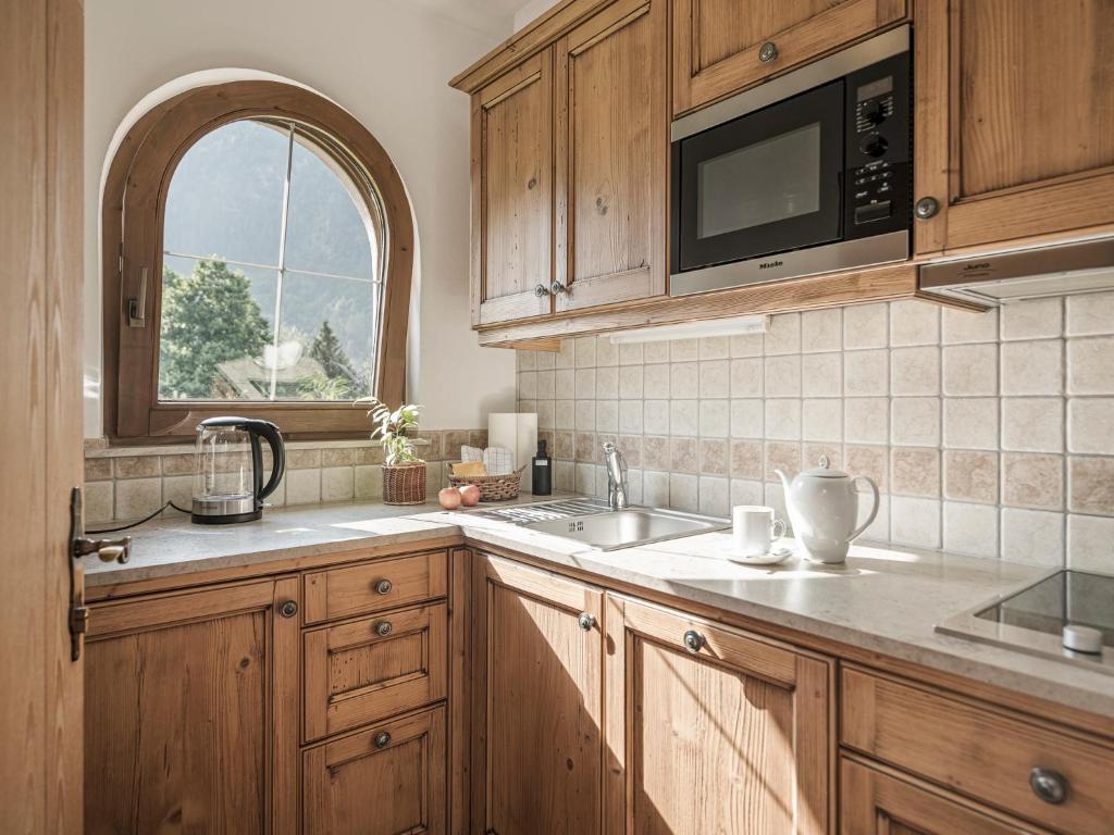 Kuchyň nebo kuchyňský kout v ubytování Apparthotel "Landhaus Veronika"