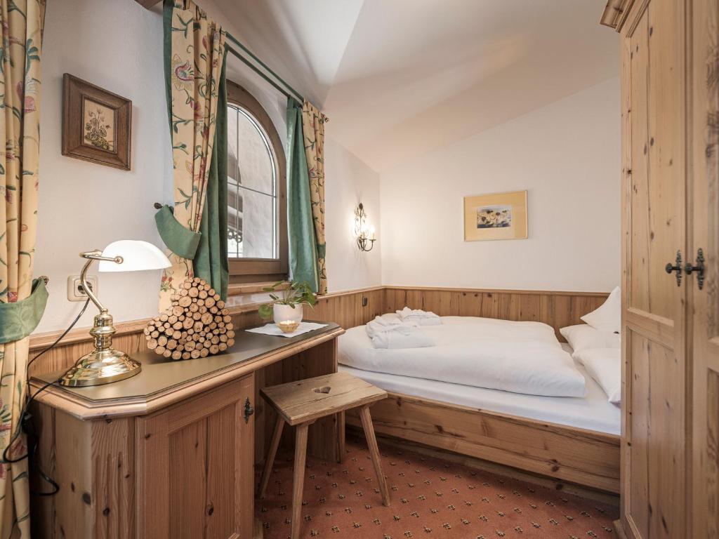 Postel nebo postele na pokoji v ubytování Apparthotel "Landhaus Veronika"