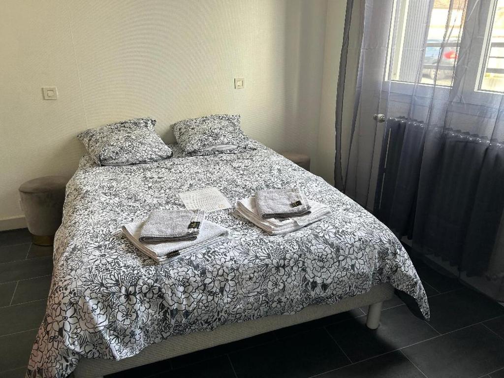 Postel nebo postele na pokoji v ubytování L'alliance de Sologne