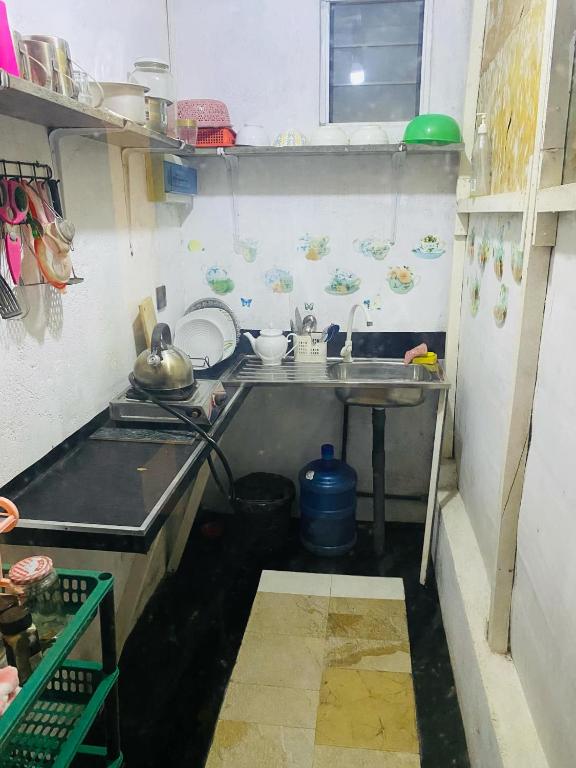 Kuchyň nebo kuchyňský kout v ubytování Villa Kubura Mirissa