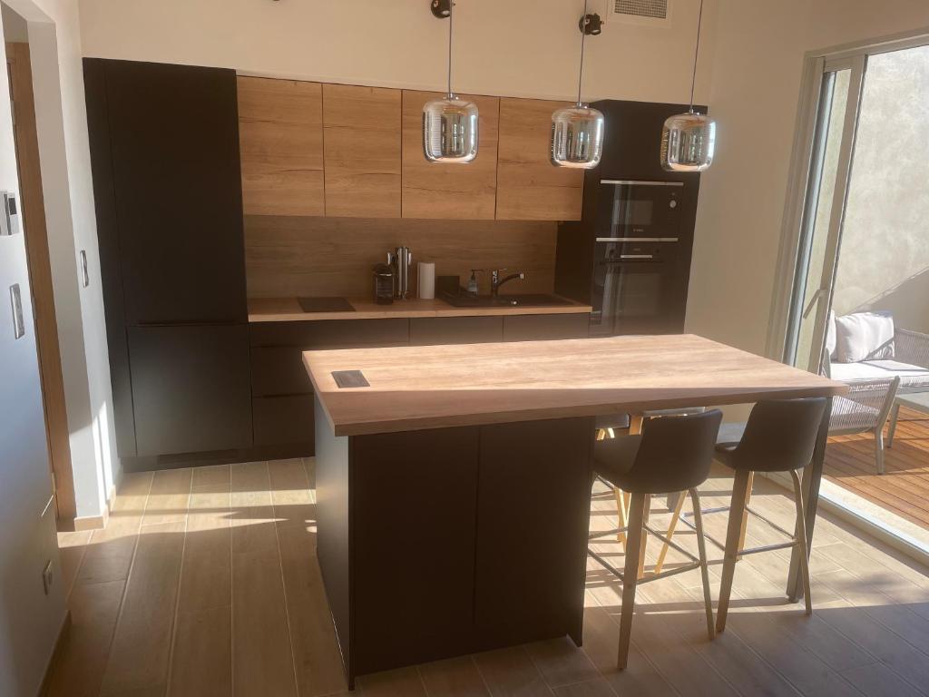 Kuchyň nebo kuchyňský kout v ubytování logement avec jacuzzi