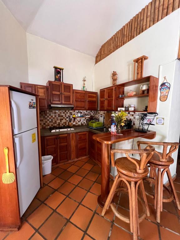 Kuchyň nebo kuchyňský kout v ubytování Cabañas La Casa de Pucha