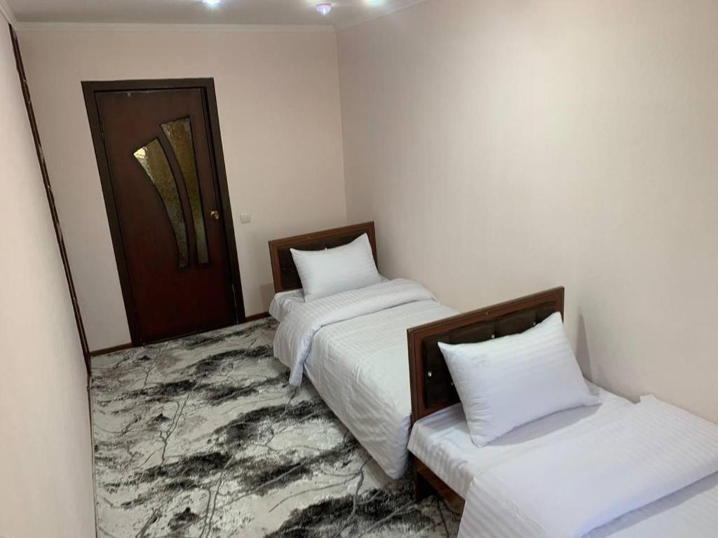 Postel nebo postele na pokoji v ubytování Samir