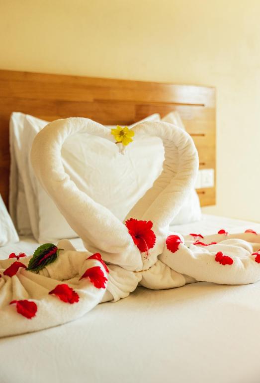 Postel nebo postele na pokoji v ubytování Relax Lodge