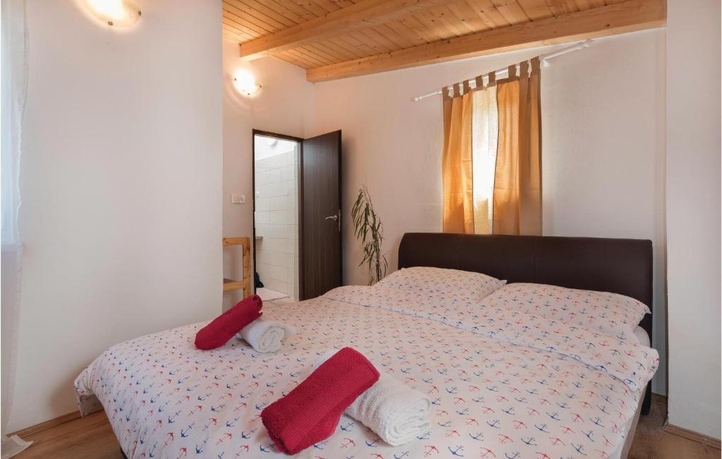 Postel nebo postele na pokoji v ubytování Two-Bedroom Holiday Home In Valtura