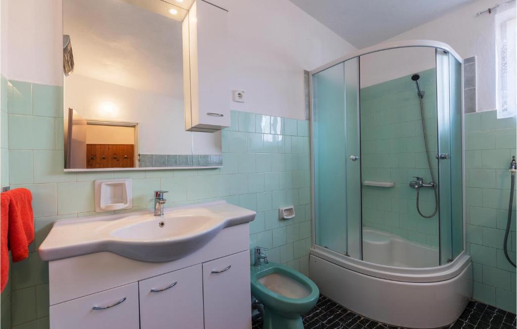 Kúpeľňa v ubytovaní Apartment Valtura 13