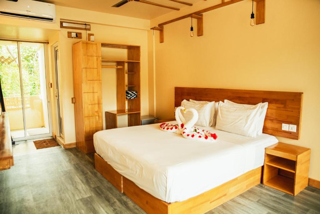 Postel nebo postele na pokoji v ubytování Relax Lodge